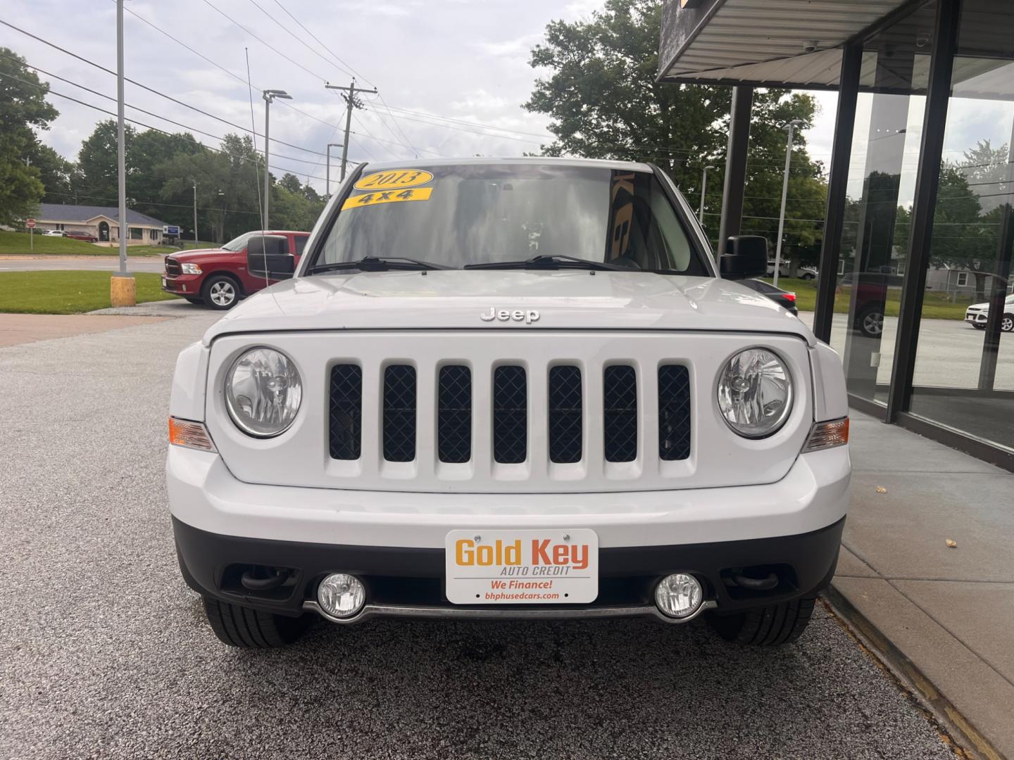 2013 Bright White Jeep Patriot Latitude 4WD (1C4NJRFB5DD) with an 2.4L L4 DOHC 16V engine, located at 1633 W Kimberly, Davenport, IA, 52806, (563) 323-5341, 41.559456, -90.598732 - Photo#2